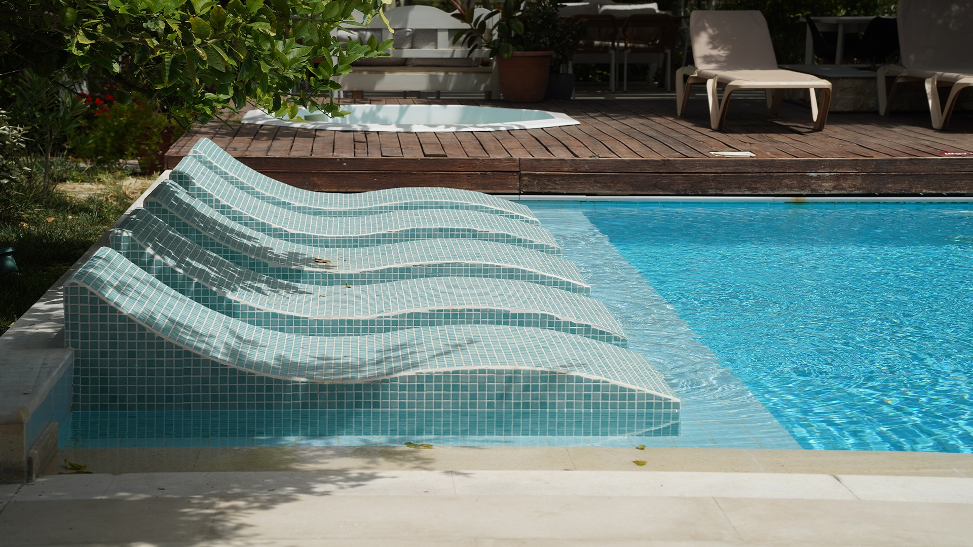 Who wouldn’t want to be on vacation in a hotel with pools and gardens during summer?